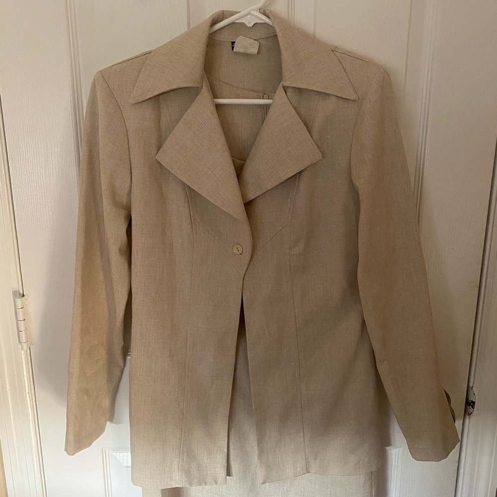 Suit dress with jacket.